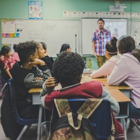 Students in a classroom with their teacher