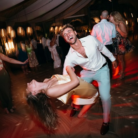 A couple dancing at a party
