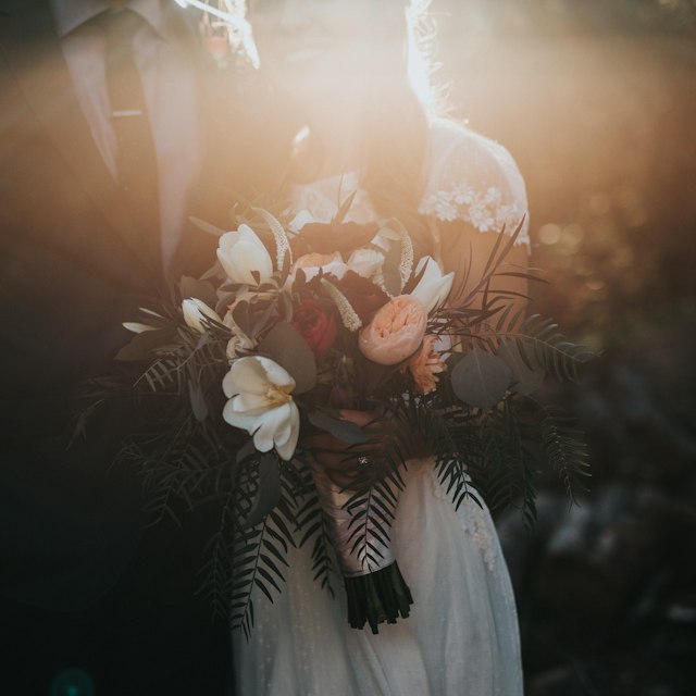 A bride smiling at her wedding